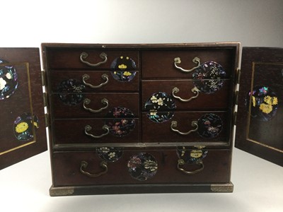 Lot 705 - AN EARLY 20TH CENTURY CHINESE LACQUERED TABLE CABINET