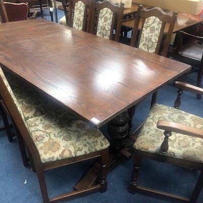 Lot 284 - AN OAK SIDEBOARD, DINING TABLE AND SIX CHAIRS