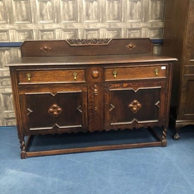 Lot 284 - AN OAK SIDEBOARD, DINING TABLE AND SIX CHAIRS