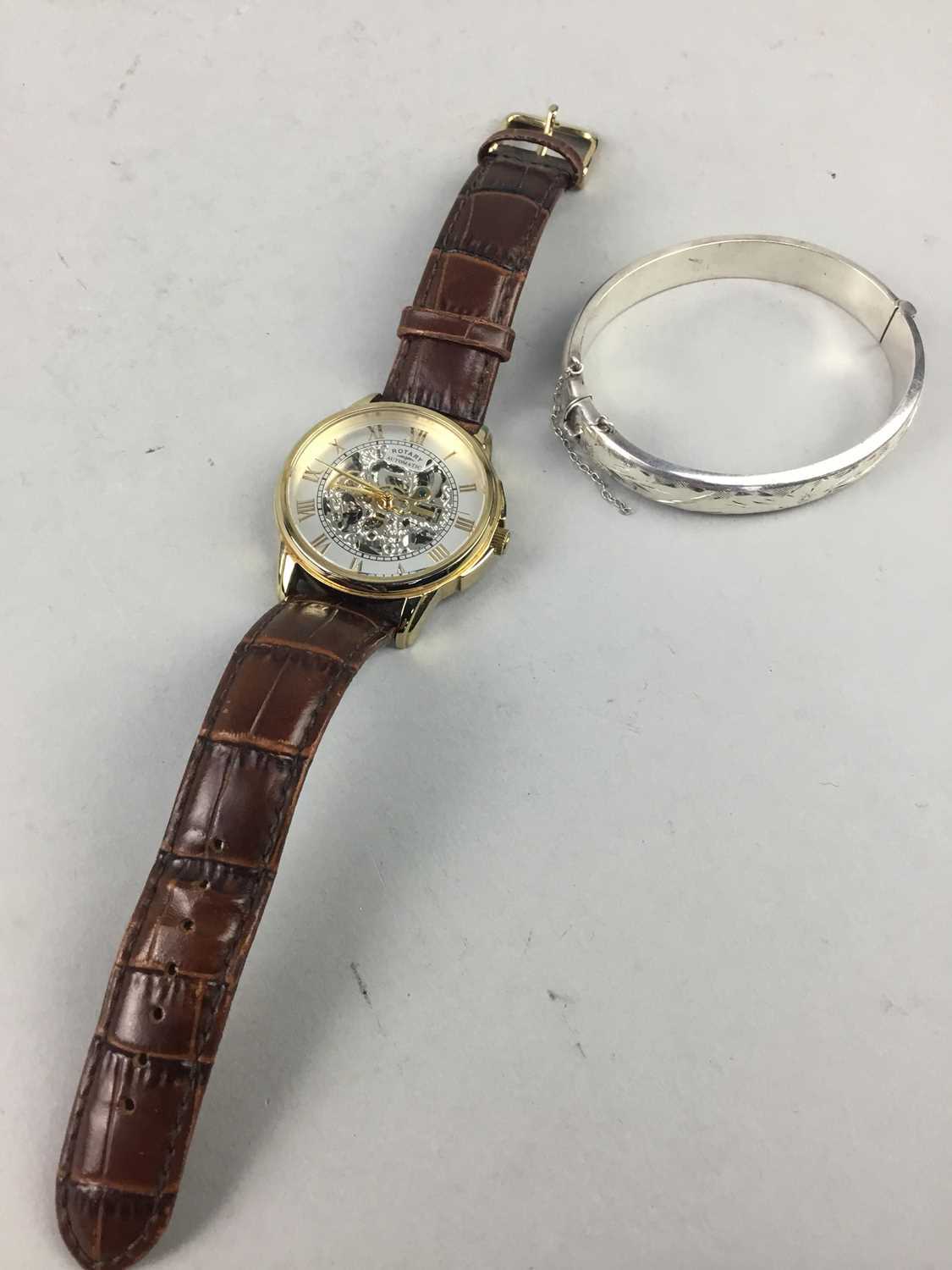 Lot 3 - A GENTLEMAN'S ROTARY WRISTWATCH AND A SILVER BANGLE