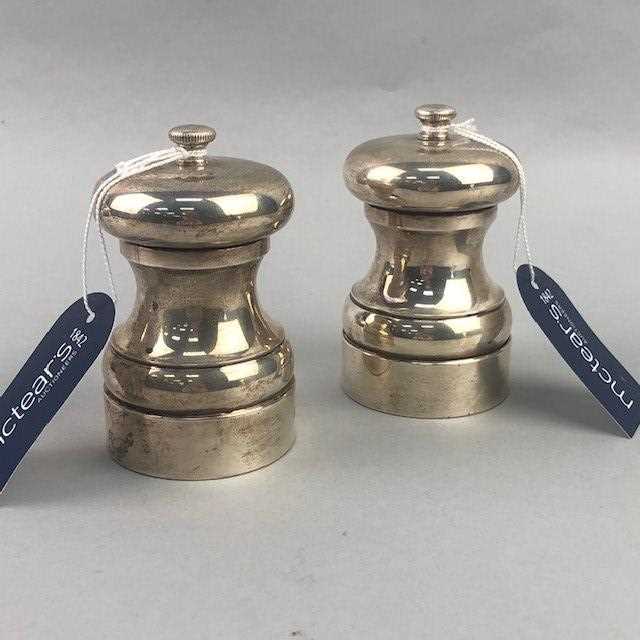Lot 101 - A LOT OF TWO MODERN SILVER PEPPER MILLS
