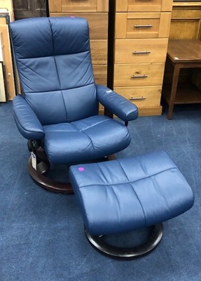 Lot 112 - A STRESSLESS BLUE RECLINER CHAIR AND MATCHING STOOL