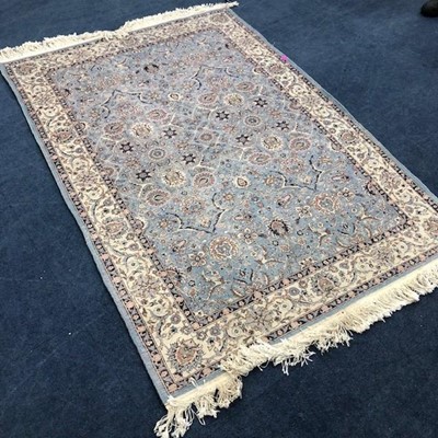 Lot 118 - A 20TH CENTURY RUG