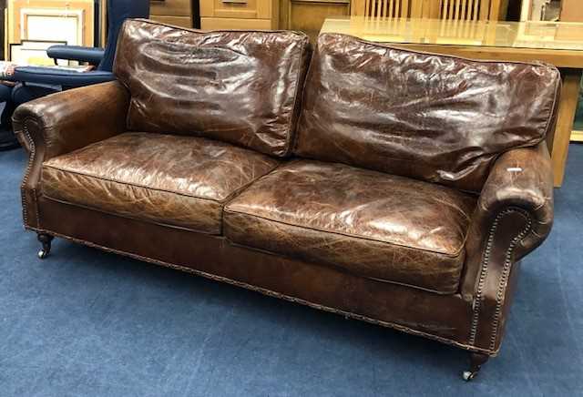 Lot 113 - A BROWN LEATHER THREE SEAT SETTEE
