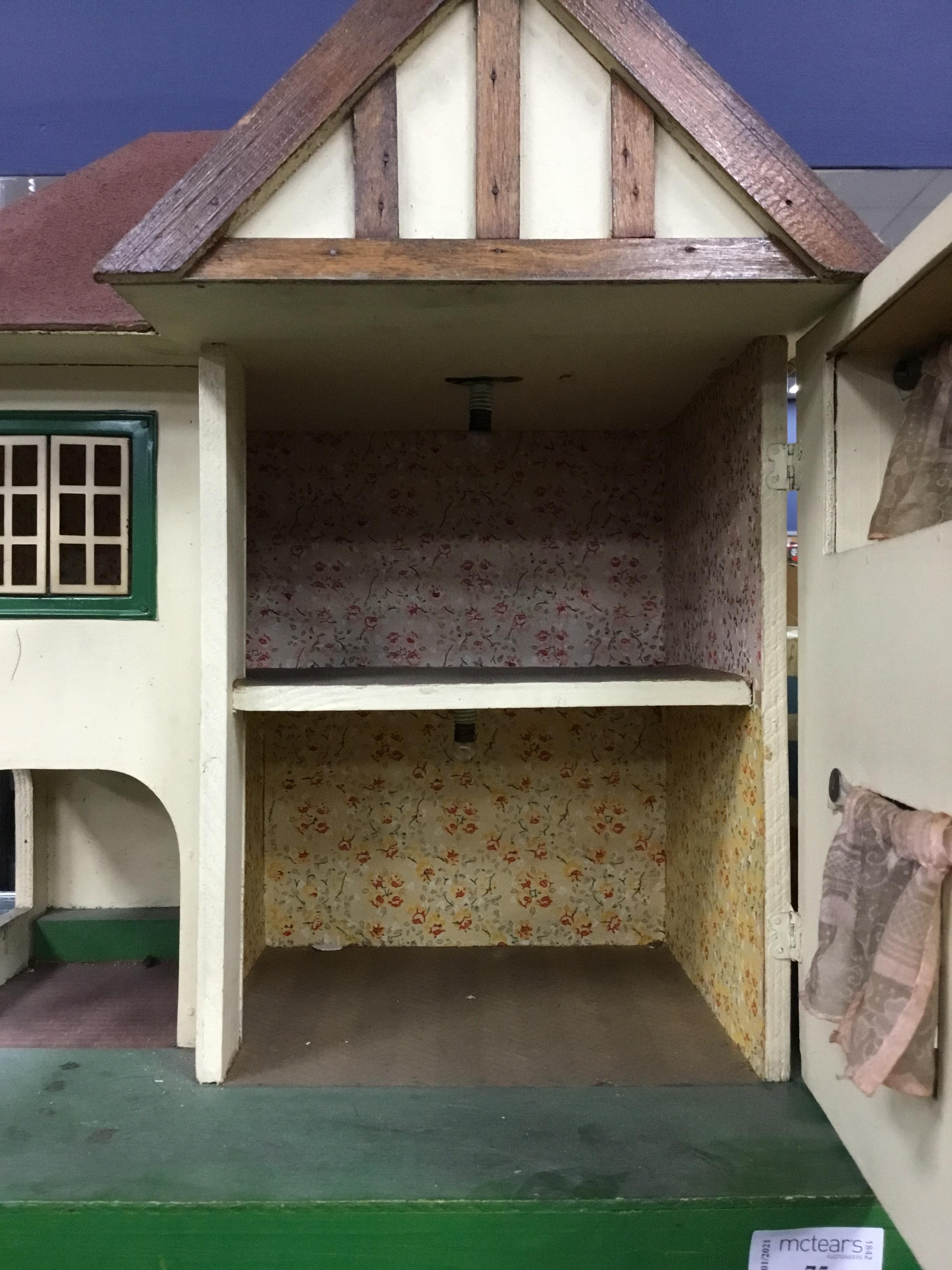 Lot 75 A VINTAGE DOLLS HOUSE WITH ACCESSORIES