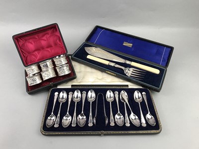Lot 309 - A SET OF SIX WHITE METAL NAPKIN RINGS AND CUTLERY