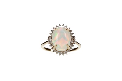 Lot 328 - AN OPAL AND DIAMOND RING
