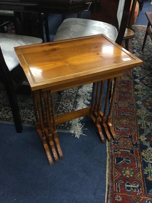 Lot 476 - A YEW WOOD NEST OF THREE TABLES AND A MAHOGANY OVAL TABLE
