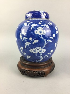 Lot 196 - A PAIR OF BLUE AND WHITE GINGER JARS AND COVERS, ANOTHER JAR AND TWO STANDS