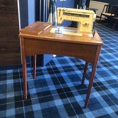 Lot 64 - A SINGER SEWING MACHINE TABLE