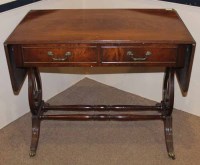 Lot 1032 - MAHOGANY SOFA TABLE OF REGENCY DESIGN with two...