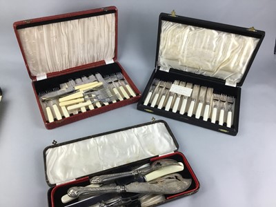Lot 116 - A STAINED WOOD CANTEEN OF SILVER PLATED CUTLERY AND A CASED SET OF CUTLERY