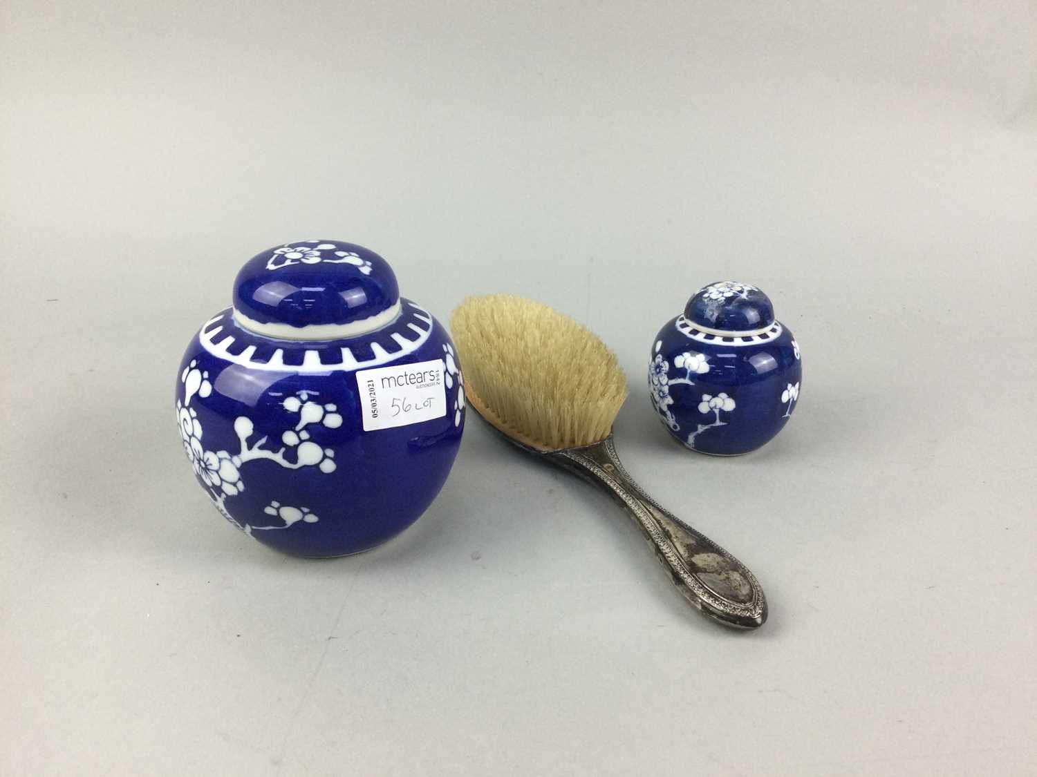 Lot 56 - A SILVER BACKED BRUSH, TWO GINGER JARS AND SILVER PLATED WARE