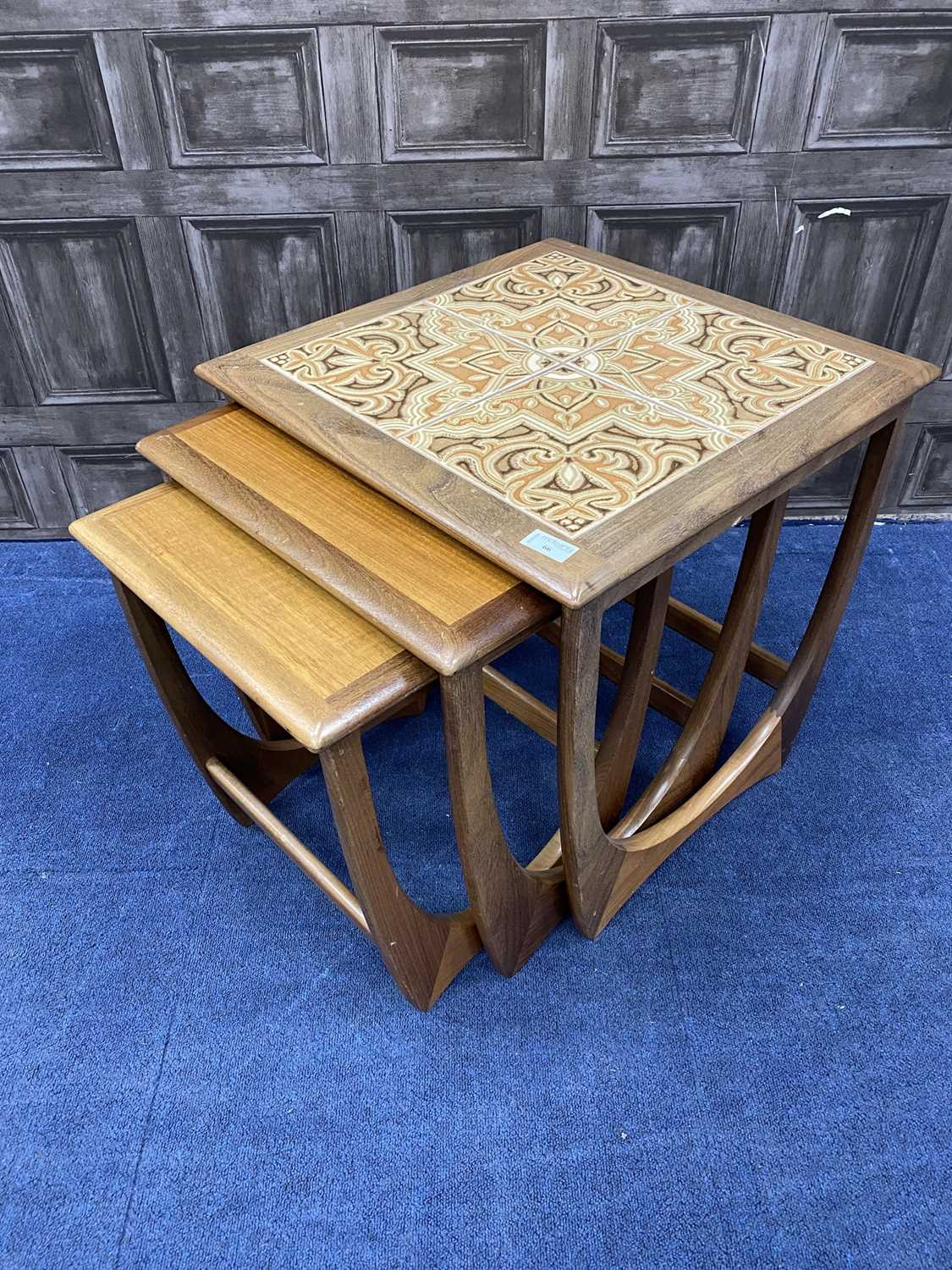 Lot 66 - A RETRO NEST OF THREE TILE TOPPED TABLES