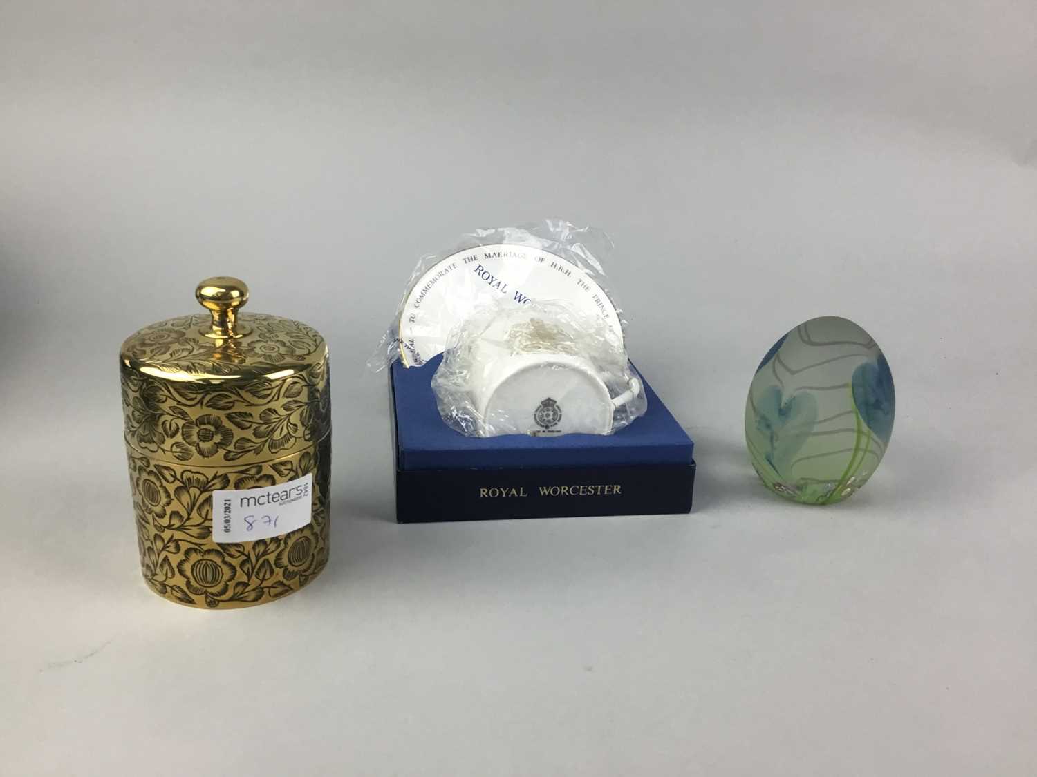 Lot 87 - A CAITHNESS PAPERWEIGHT, ROYAL WORCESTER CUP AND SAUCER AND A BRASS BOX