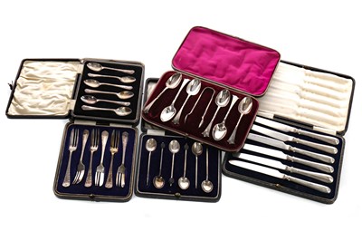 Lot 418 - A CASED SET OF SIX SILVER HANDLED KNIVES, A SET OF PASTRY FORKS AND THREE SETS OF SPOONS