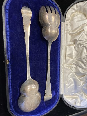 Lot 422 - A PAIR OF LATE VICTORIAN SILVER SERVERS