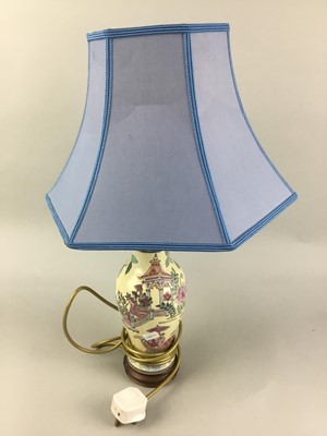 Lot 102 - A BLUE AND WHITE CERAMIC TABLE LAMP AND THREE OTHERS