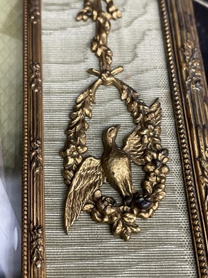 Lot 308 - AN EARLY 20TH CENTURY ORMOLU DOUBLE PICTURE FRAME