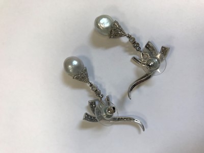 Lot 539 - A PAIR OF PEARL AND DIAMOND EARRINGS