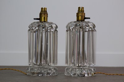 Lot 438 - A PAIR OF EARLY 20TH CENTURY CUT GLASS TABLE LAMP LUSTRES