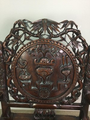 Lot 768 - A CHINESE IRONWOOD ARMCHAIR