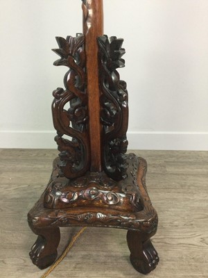 Lot 771 - A CHINESE CARVED WOOD FLOOR STANDING LAMP