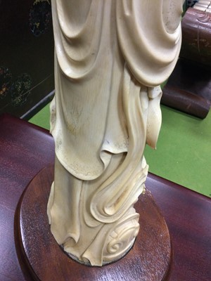 Lot 921 - A LATE 19TH/EARLY 20TH CENTURY CHINESE IVORY CARVING OF CAO GUOJIU