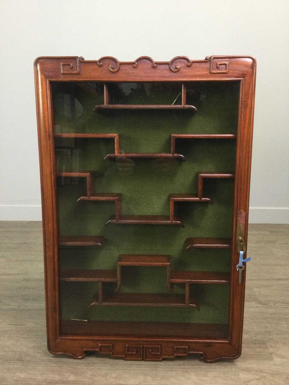 Lot 658 - A 20TH CENTURY CHINESE WALL MOUNTING DISPLAY CABINET