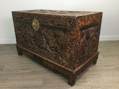Lot 785 - AN EARLY 20TH CENTURY CHINESE CAMPHORWOOD CHEST ON STAND