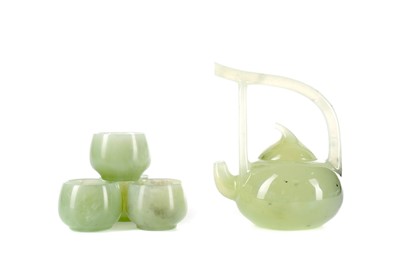 Lot 847 - A CHINESE GREEN JADE WINE POT AND FOUR CUPS