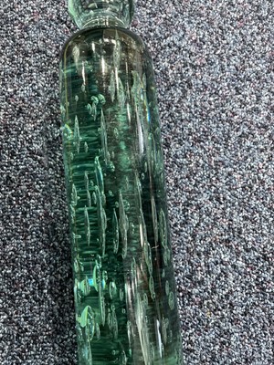 Lot 1046 - A GREEN GLASS ROLLING PIN AND A NAILSEA STYLE GLASS ROLLING PIN