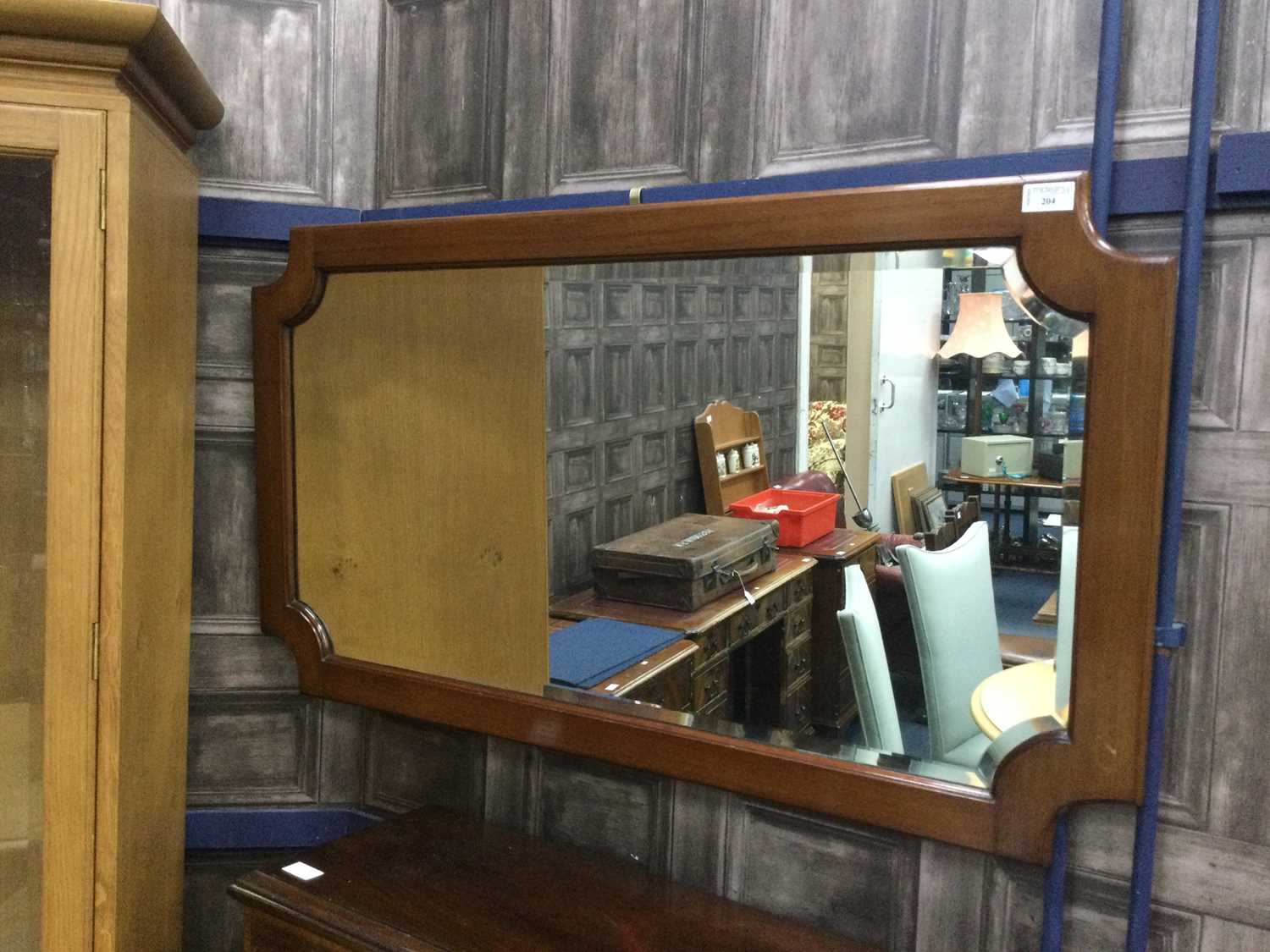 Lot 204 - A MAHOGANY FRAMED RECTANGULAR SHAPED WALL MIRROR