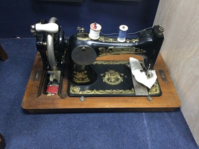 Lot 205 - A SEWING MACHINE IN CARRY CASE