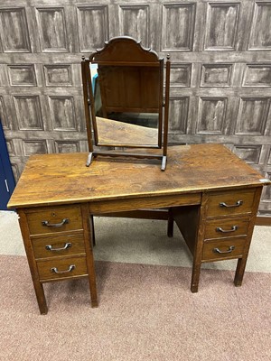 Lot 205 - AN OAK DESK AND A DRESSING TABLE MIRROR