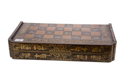 Lot 718 - AN EARLY 20TH CENTURY JAPANNED GAMES BOARD