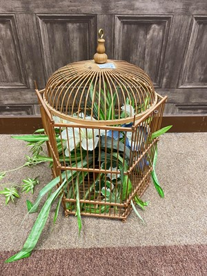 Lot 144 - A HEXAGONAL CANE BIRD CAGE
