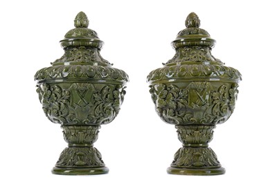 Lot 284 - A PAIR OF LATE VICTORIAN MAJOLICA VASES AND COVERS