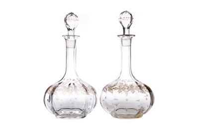 Lot 500 - A PAIR OF LATE VICTORIAN GLASS DECANTERS