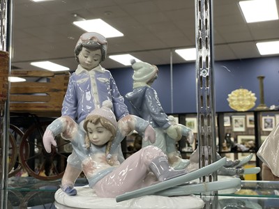 Lot 239 - A LLADRO FIGURE OF CHILDREN SKIING AND ANOTHER LLADRO FIGURE
