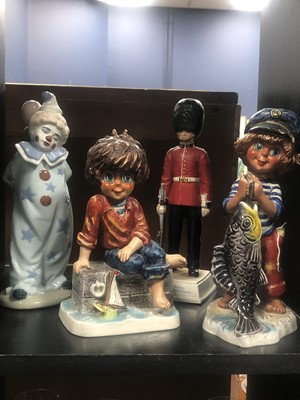 Lot 191 - A GOEBEL FIGURE OF 'FISHERMANS LUCK' BY MICHEL T AND THREE OTHERS