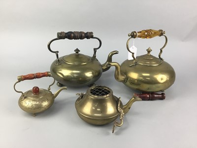 Lot 320 - A LOT OF FOUR BRASS KETTLES ALONG WITH A TANTALUS