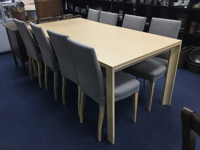 Lot 330 - A MODERN PINE DINING TABLE AND EIGHT CHAIRS