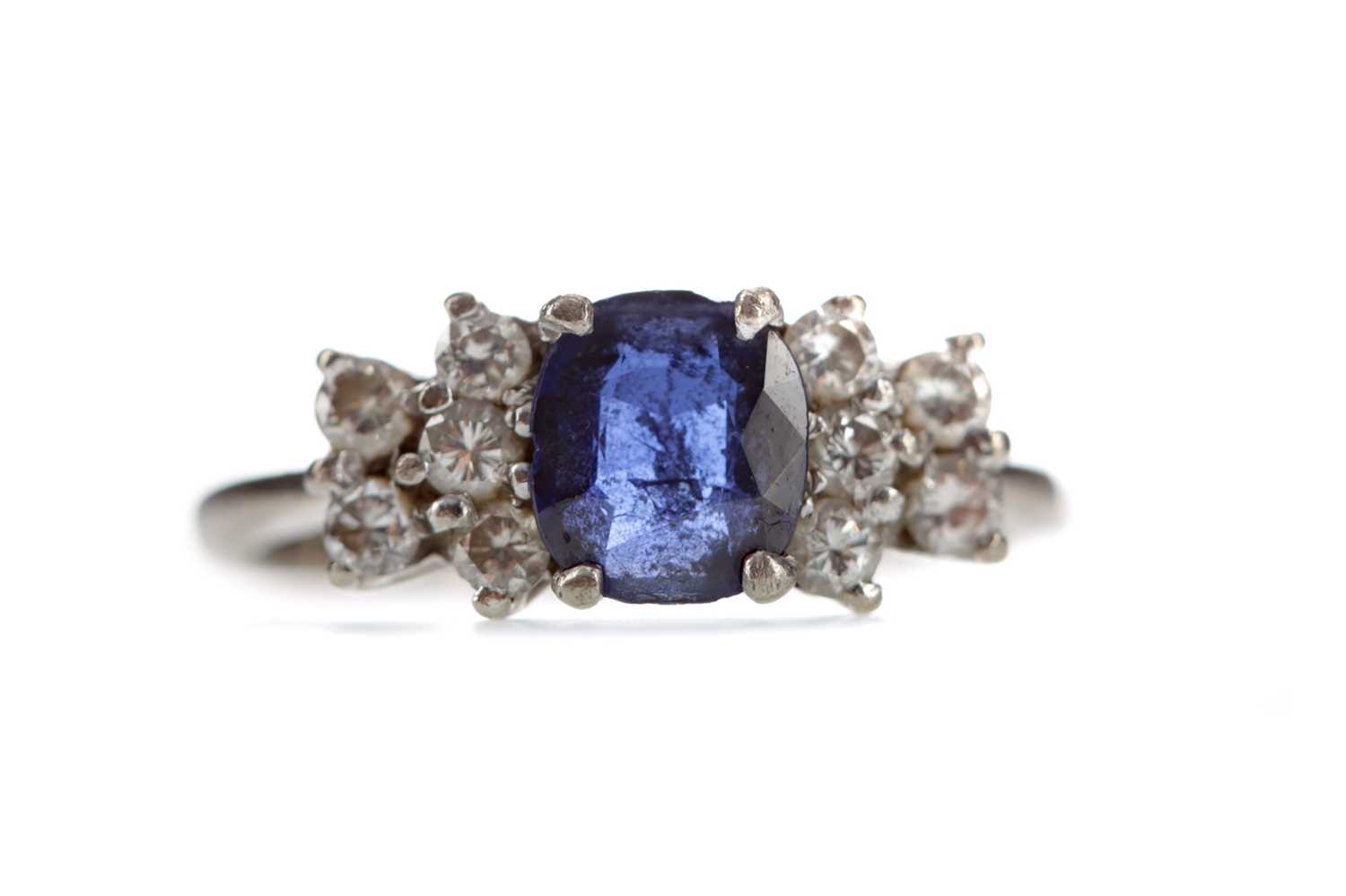 Lot 304 - A BLUE GEM SET AND DIAMOND RING