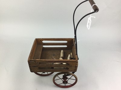 Lot 394 - AN EARLY 20TH CENTURY TRI-ANG MODEL DAIRY CART