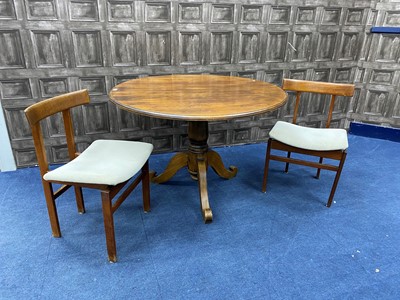 Lot 379 - A STAINED WOOD CIRCULAR DINING TABLE AND FOUR CHAIRS