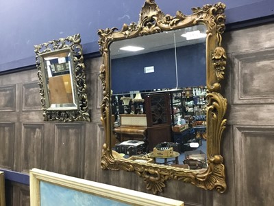Lot 390 - A BRASS FRAMED WALL MIRROR AND ANOTHER