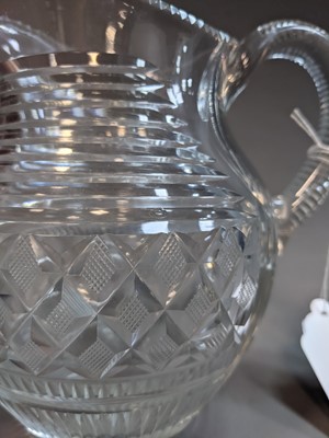 Lot 461 - AN EARLY 19TH CENTURY CUT GLASS JUG