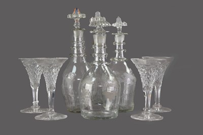 Lot 141 - A COLLECTION OF FOUR LATE VICTORIAN GLASS DECANTERS, ALONG WITH FOUR WINE GLASSES