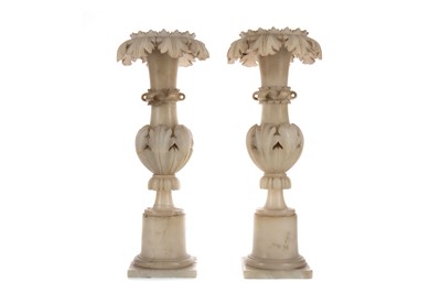 Lot 536 - A PAIR OF LATE 19TH CENTURY ALABASTER ALTAR CANDLESTICKS